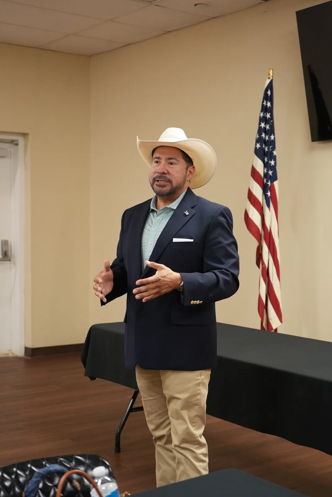 Ernie Gonzalez Jr. speaking at a public meeting