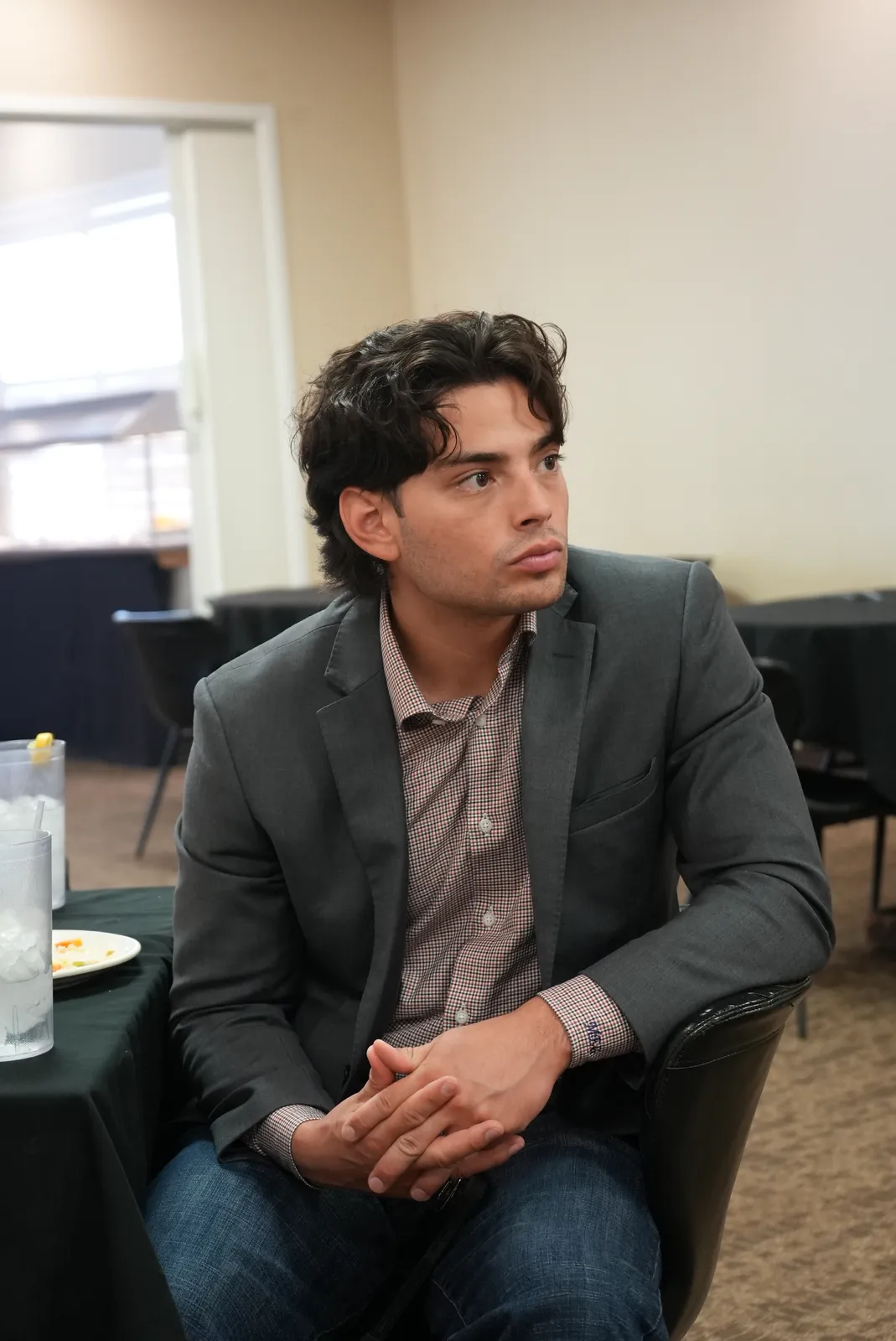 Mitchell Elias Gonzalez in a meeting